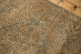 Distressed pile texture of Karaja runner, featuring sky blue geometric motifs.