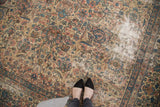 Lavar Kerman rug detail: Shah Abbas florals in ivory, blush, sky blue, with visible wear.