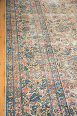 Lavar Kerman rug detail: intricate Shah Abbas floral border, palmettes in ivory, blush, sky blue.