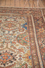 Vintage Mahal rug's ivory field and colorful lattice pattern meeting the rust border.