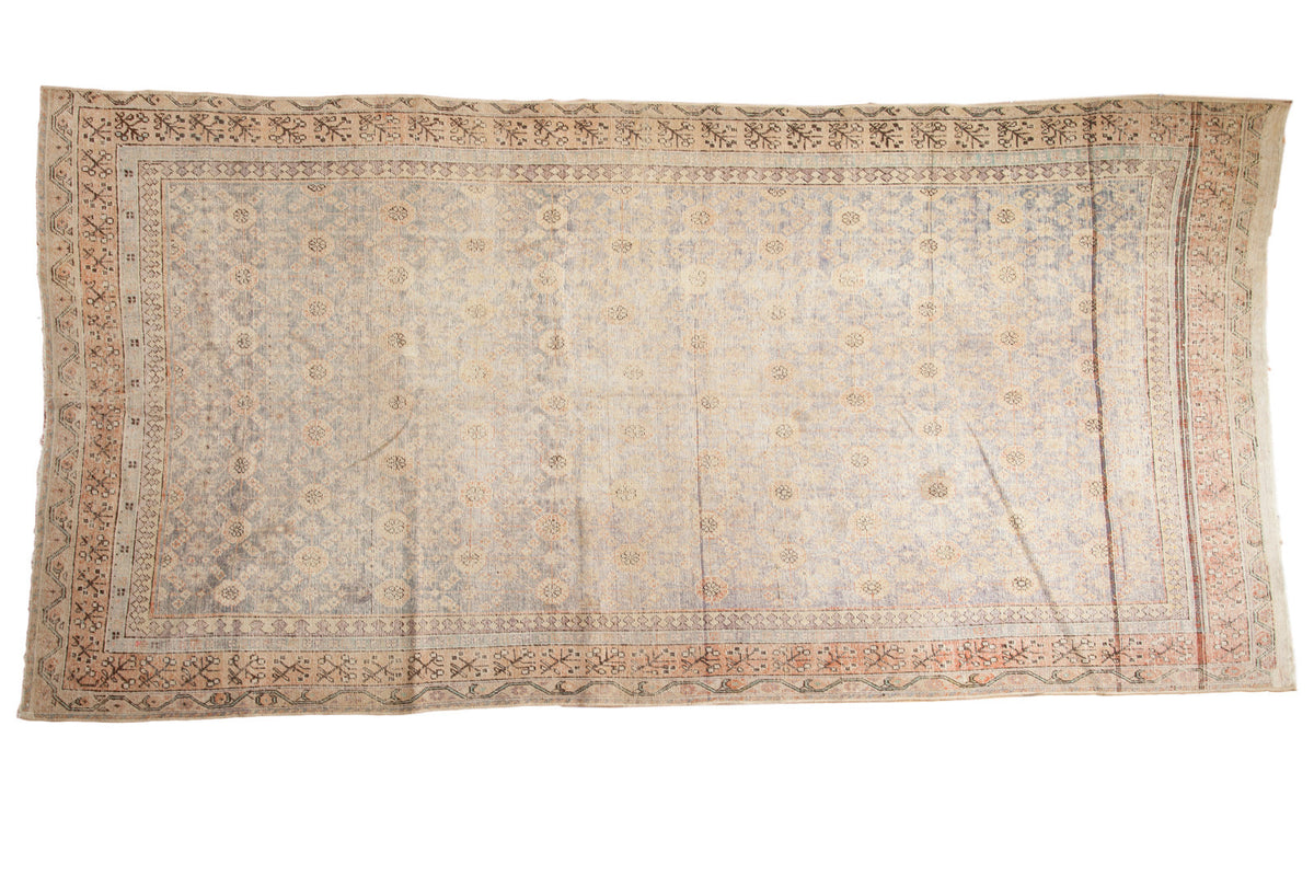 Antique Khotan runner, faded teal blue, apricot, and ivory allover floral lattice, 5'9" x 11'8".