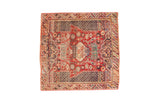 Vintage Sirjan square rug in cherry red, featuring playful allover geometric and floral motifs.