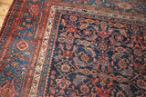 Vintage Persian Bijar carpet corner: Herati motif field, samovar border design, navy, blush, sky blue.