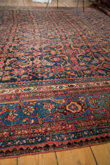 Vintage Persian Bijar carpet detail: samovar motif border, Herati pattern, navy and blush.