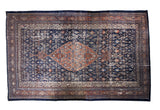 Vintage Persian Bibikabad carpet, distressed navy and terra cotta medallion, allover herati motif.