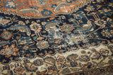 Distressed texture and deep colors of vintage Bibikabad carpet, revealing foundation.