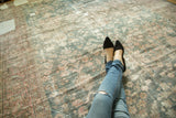 Hand-knotted Distressed Mahal carpet showing faded floral patterns and visible worn texture.