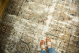 Distressed vintage Mahal carpet with mostly even wear to knot heads and floral vinery.