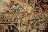 Distressed Persian Mahal carpet: worn pile, tightly woven foundation, and fringe.