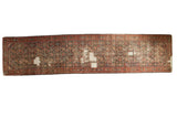Distressed antique Fereghan runner, allover Herati pattern, charcoal, blush, and time-softened hues. 3'4