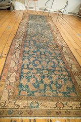 Distressed Malayer runner end, showing even wear to knot heads, sky blue Herati, blush crab border.