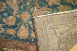 Distressed Malayer runner pile showing sky blue, aubergine hues and hand-knotted foundation.