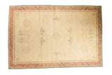 Distressed Indo Chinese carpet, antique ivory field, scalloped medallions, cloud bats, 6x9.