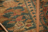 Distressed Hamadan carpet texture with wear to knot heads, teal, peach, and ivory tones.