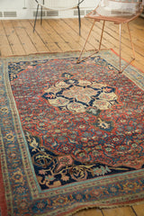 Antique Fine Halvaie Bijar carpet: scalloped medallion, cherry red Herati field, navy spandrel.