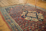 Artistic fine antique Bijar carpet's roundel medallion, paisley boteh, and Herati field.