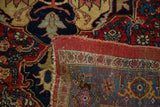 Robust red binding and detailed hand-knotted foundation of the antique Halvaie Bijar rug.