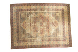 Antique Kerman carpet, distressed ivory, wine red, and sky blue mil fluer medallion.