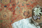 Antique Mahal carpet's cinnabar palmettes, navy lotus, and green vines, revealing foundation.