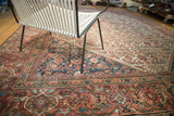 Antique Mahal carpet corner, navy spandrel, blush herati field, softly worn pile.