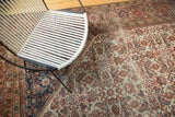 Allover Herati motif and corner spandrel on antique Persian Mahal rug with aged pile.