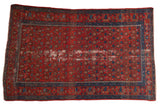 Vintage Malayer rug with rust red field, allover paisley boteh, blue geometric border, natural distress.