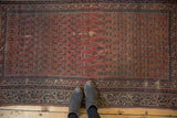 Antique Malayer rug's Laleh Abassi and barber pole borders, worn blush mir boteh field.