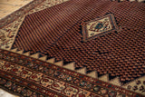 Vintage Malayer rug's repeating mir boteh field with stepped contour in navy and blush.