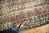 Distressed blush rose herati field and blue turtle samovar border on an antique Malayer runner.