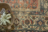 Antique Malayer runner detail: blue turtle samovar border, blush herati field, and patina.