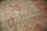 Textured, low pile of a vintage Oushak carpet reveals the hand-knotted foundation and blush pattern.