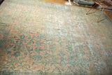 Elongated view of antique Persian Kerman runner, allover blush and sea foam floral design with even wear.