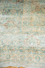 Intricate repeating shadow motif in sea foam green and antique ivory tones.