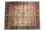 Antique Yazd carpet with faded cranberry field, deep indigo floral borders, central medallion, 8x10.