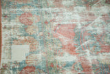 Visible restrung foundation and heavily distressed surface of vintage Mahal carpet.