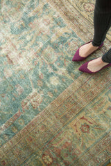 Antique Mahal carpet texture, showing mostly even wear to the knot heads in sky blue and gold.