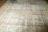 Vintage Malayer carpet with blush, sea foam green, ivory tones, showing mostly even wear.
