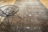 Faded madder root red Herati motif on an antique Fereghan with visible restrung foundation.