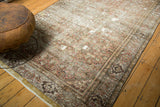 Antique Fereghan carpet with mostly even wear revealing plain-woven foundation and detailed Herati motif.
