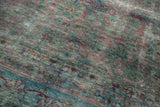 Aubergine, teal, and aqua abrash on worn Shah Abas design of antique Yezd carpet.
