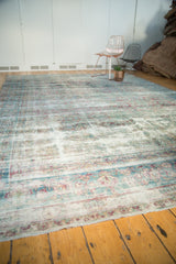 Antique Yezd carpet's faded aqua and aubergine Shah Abas design with scrolling vinery and wear.