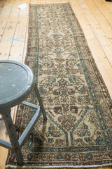 Vintage Hamadan rug runner close-up with allover Herati pattern in antique ivory and muted blue.