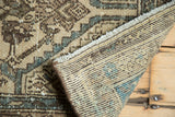 Close-up of vintage Hamadan runner: hand-knotted pile, tight foundation, and secure fringe.