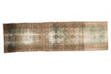 Vintage Malayer runner rug with central medallion, geometric Herati motif, bronze, ivory, and mint green.