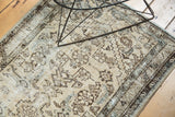 Vintage Hamadan runner's low pile, beige and brown geometric patterns, light foundation showing.