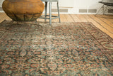 Vintage Mahal carpet's allover Herati motif in plum, indigo, beige, showing wear to knot heads.