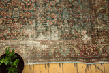 Vintage Mahal carpet detail: Herati pattern, plum and blue tones, showing mostly even wear.