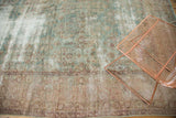 Antique Kerman carpet with exposed foundation, faded floral palmettes in sea foam green, dusty rose.