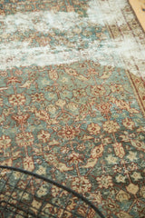 Antique Malayer runner's detailed allover floral trellis pattern, showing etching and faded aqua, ivory, and plum.