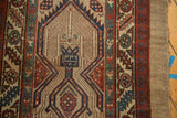 Original natural camel hair side cord selvage and traditional geometric border on antique Serab.
